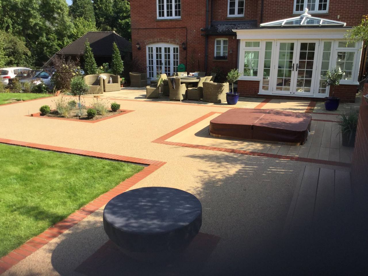 This is a photo of a Resin bound patio carried out in Stockport. All works done by Stockport Resin Driveways Solutions