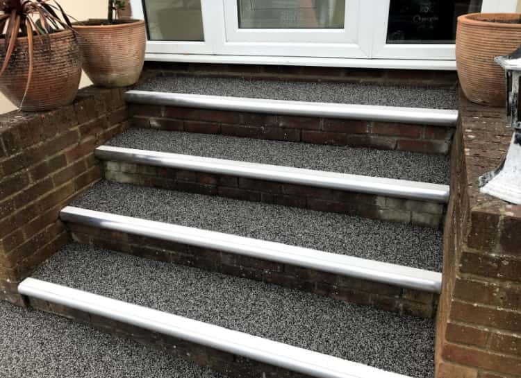 This is a photo of a Resin bound stair path carried out in Stockport. All works done by Stockport Resin Driveways Solutions
